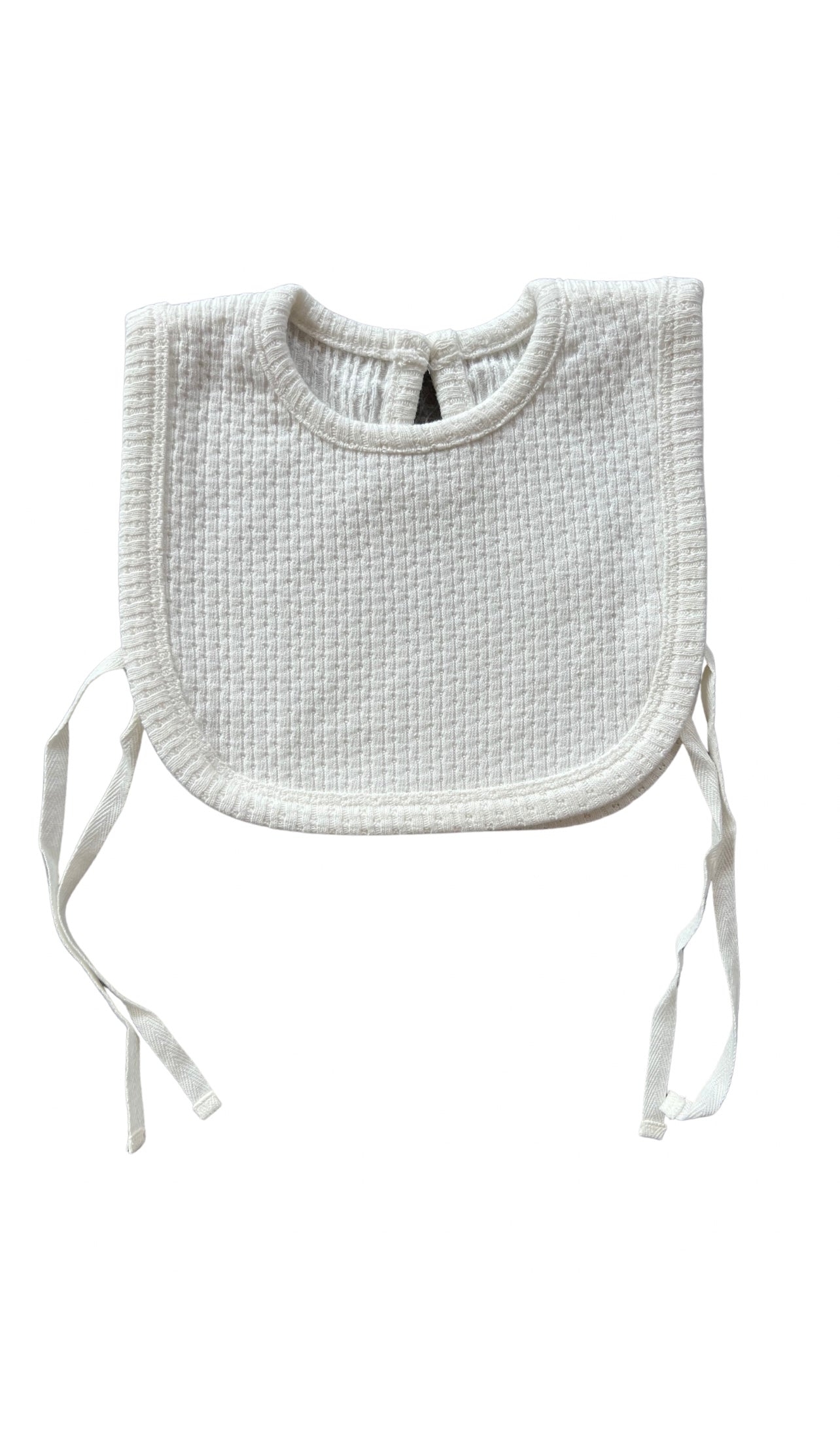 Knitted Plain Bib in White on a white background