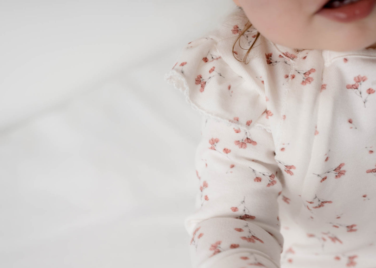Frilled Ollie Floral Onesie