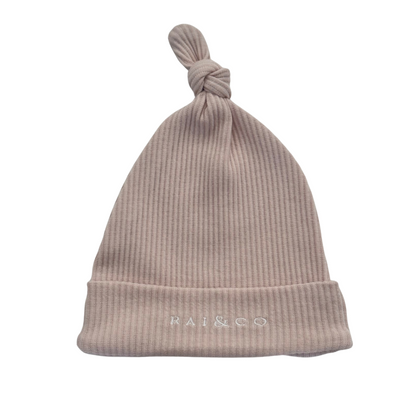 Baby Beanie Ribbed Knotted in Beige and 'RAI & CO' branding on a white background