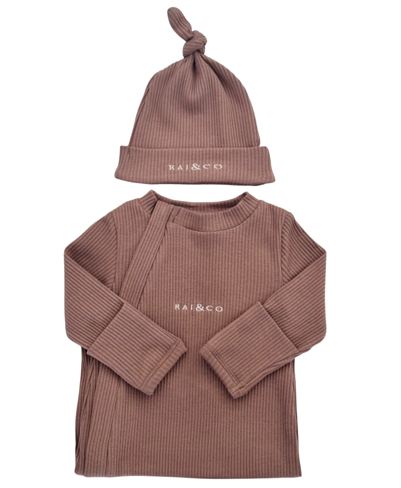 Brown ribbed baby outfit with matching Baby Beanie Ribbed Knotted in Caramel on a white background