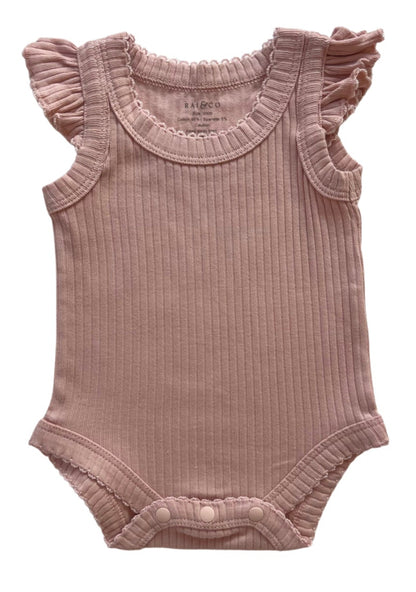 Frill Basic Singlet Bodysuit in Pink on a white background