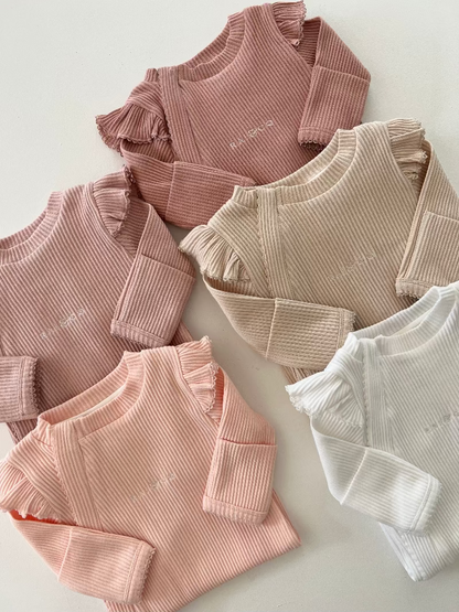 Frill Ribbed Onesie in Available Colours on a white background