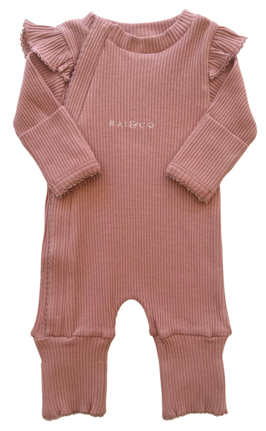 Frill Ribbed Onesie in Blush on a white background