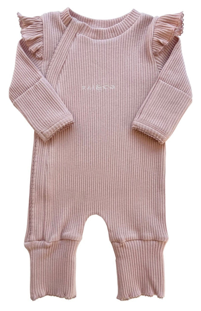 Frill Ribbed Onesie in Powder Pink on a white background
