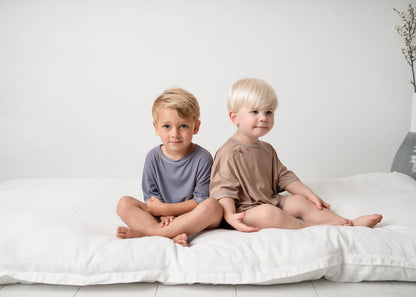 two young boy wearing a Mini Ribbed Oversized T-shirt Sets in Available Colours on a white background