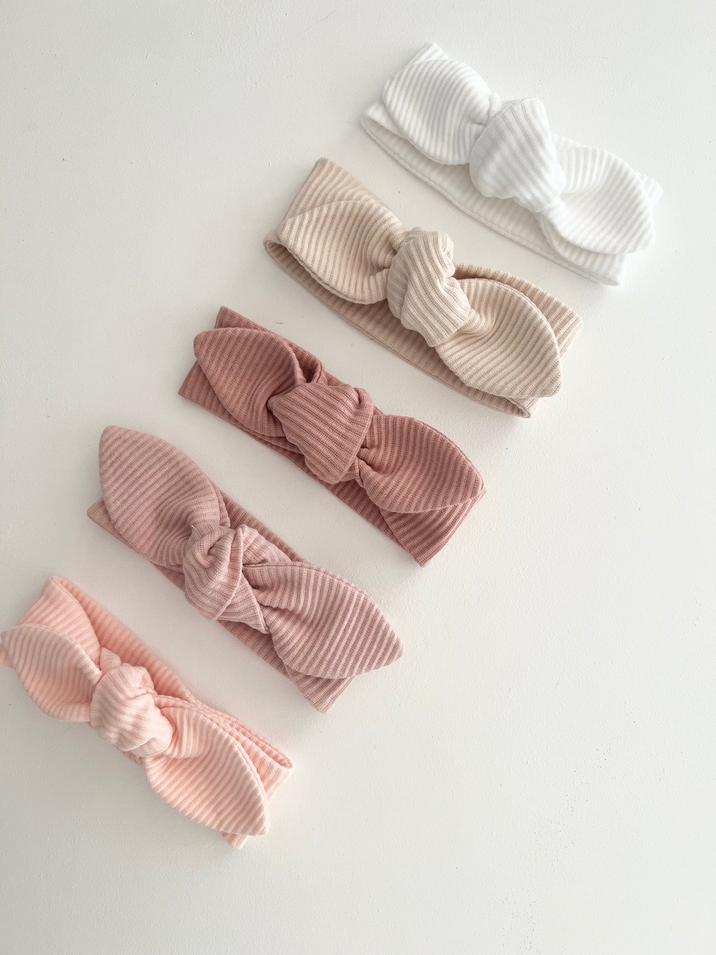 Ribbed Knotted Headbands in Available Colours on a white background