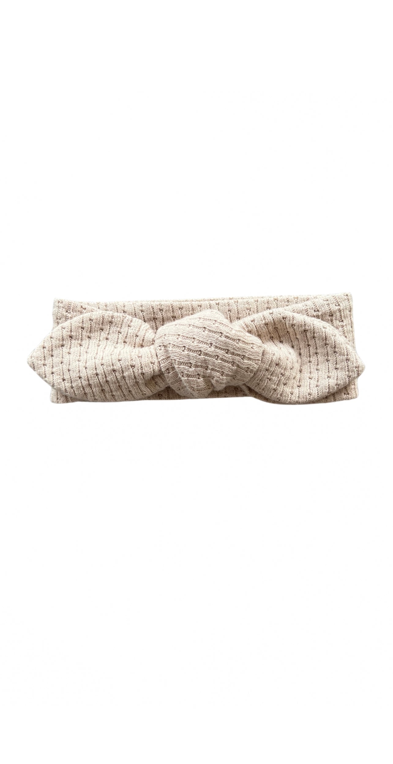 Knitted Knot Headband in Beige on a white background