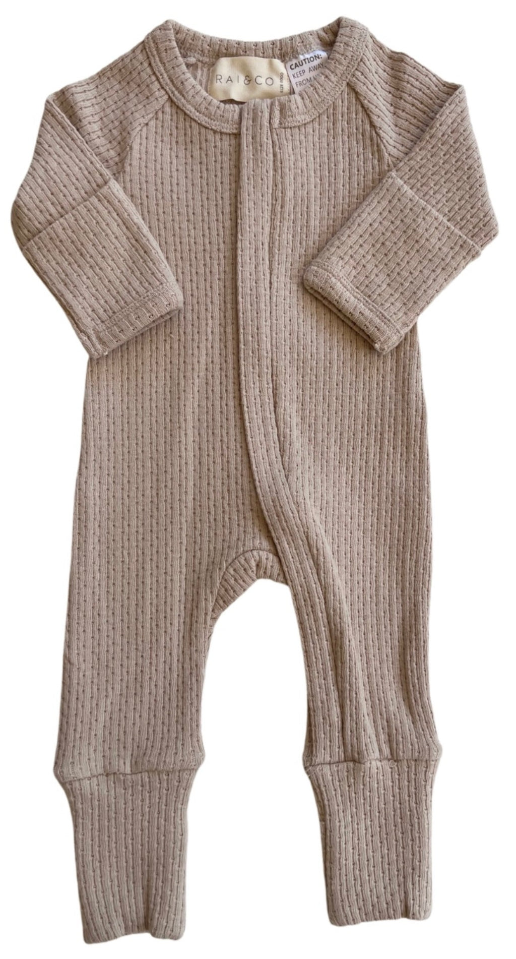 Knitted Onesie in Beige on a white background