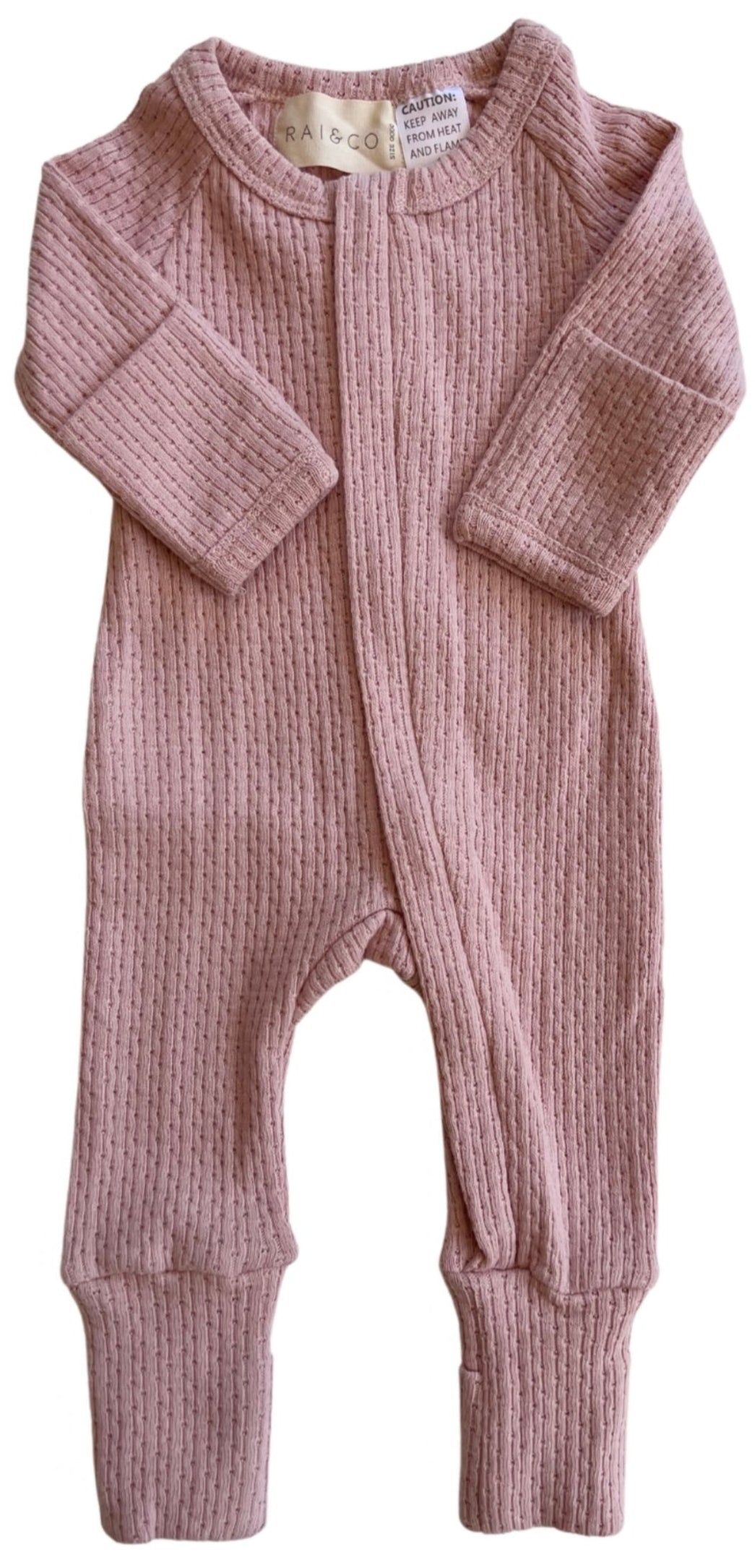 Knitted Onesie in Pink on a white background