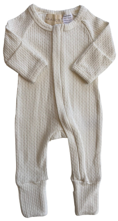 Knitted Onesie in White on a white background