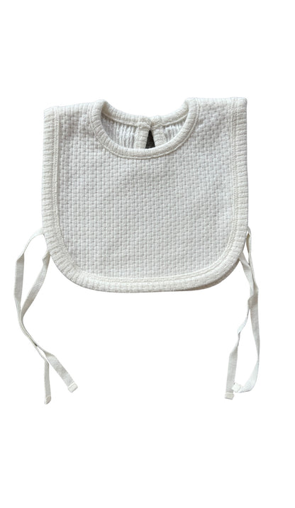 Knitted Plain Bib in White on a white background
